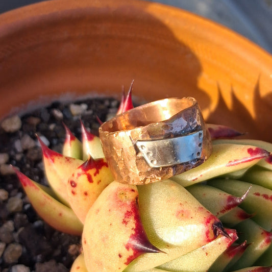 Textured copper band with dimpled sterling silver tablet
